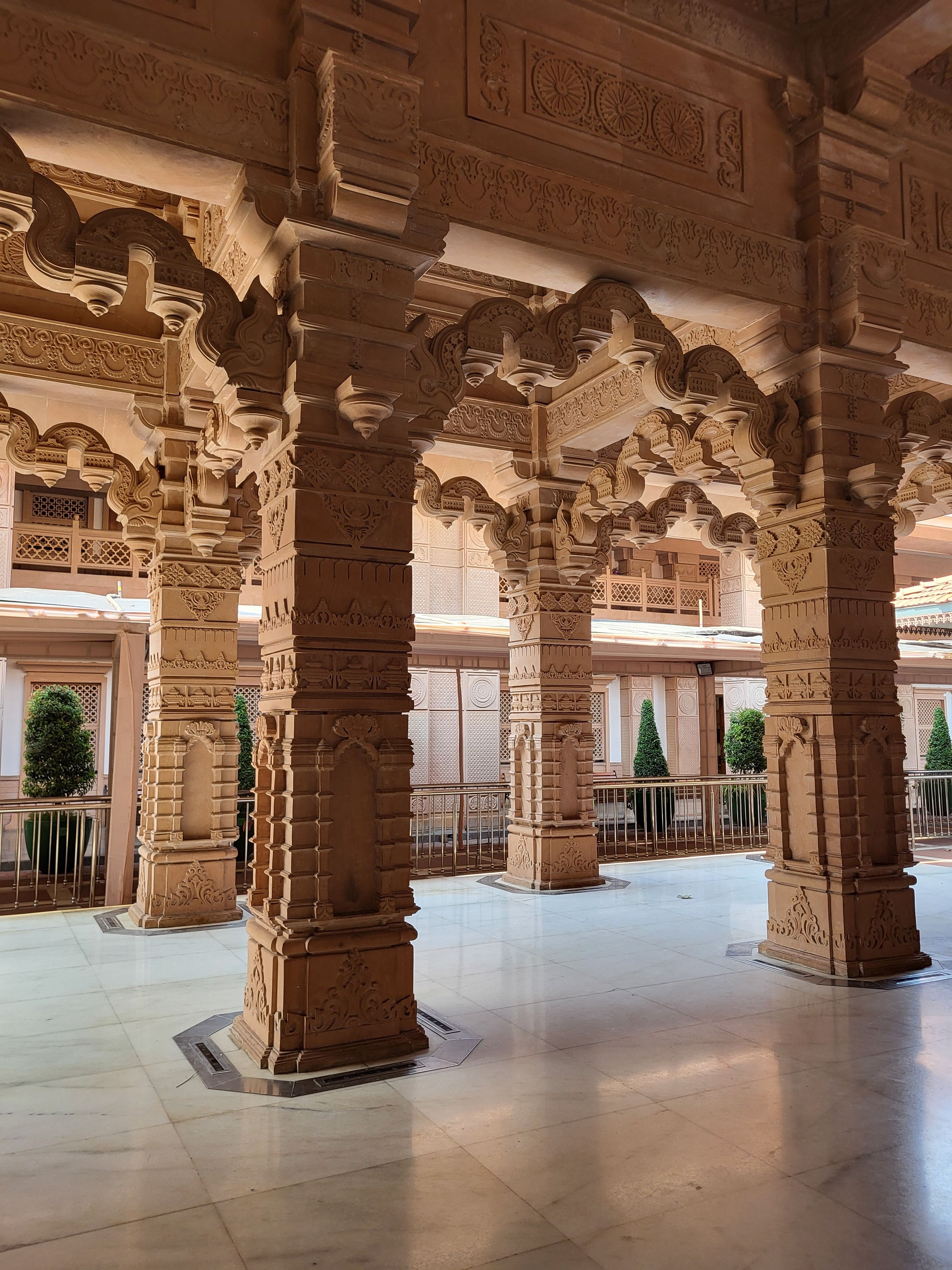 Carved marble pillar pair